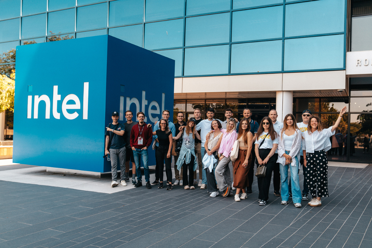 The image shows ABC Silicon Valley 2024 attendees standing in front of Intel.