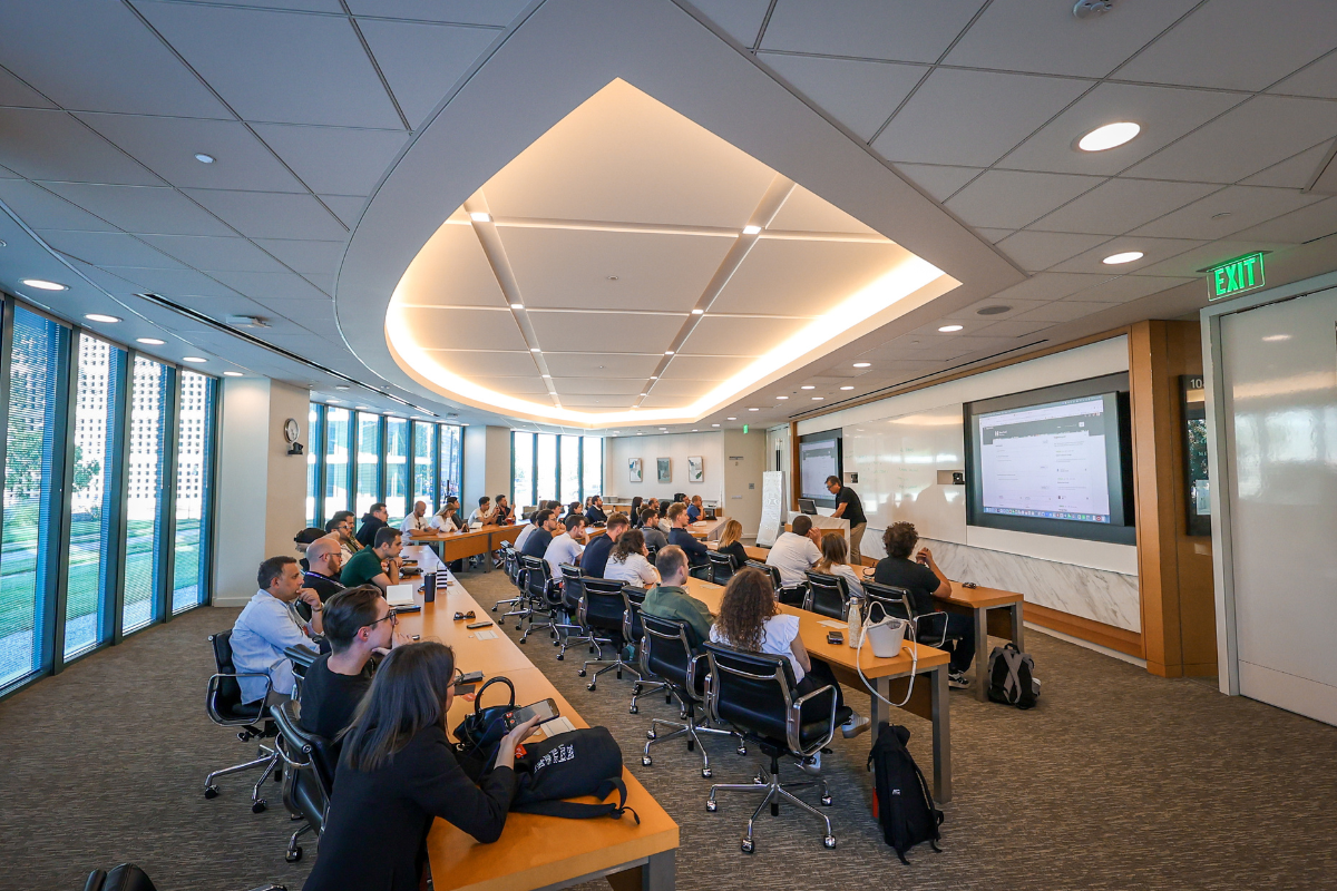 The picture shows a visit to the Oracle company during ABC Silicon Valley 2025. The picture shows all the participants and Ognjen Pavlovic, Group VP of Product Management, who is giving a lecture. 